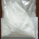 Ephedrine powder in bulk packaging